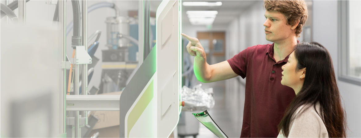 Surgeons performing minimally invasive surgery in a modern operating room